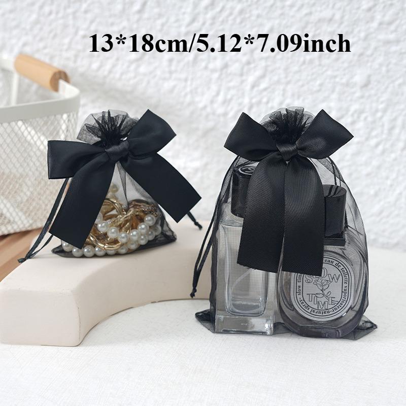 

Lovely Bowknot Nylon Organza Bundled Drawstring Ornament Bag,Gift Bag,Jewelry Bag,Mesh Bag,for Christmas,Wedding Party,Festival