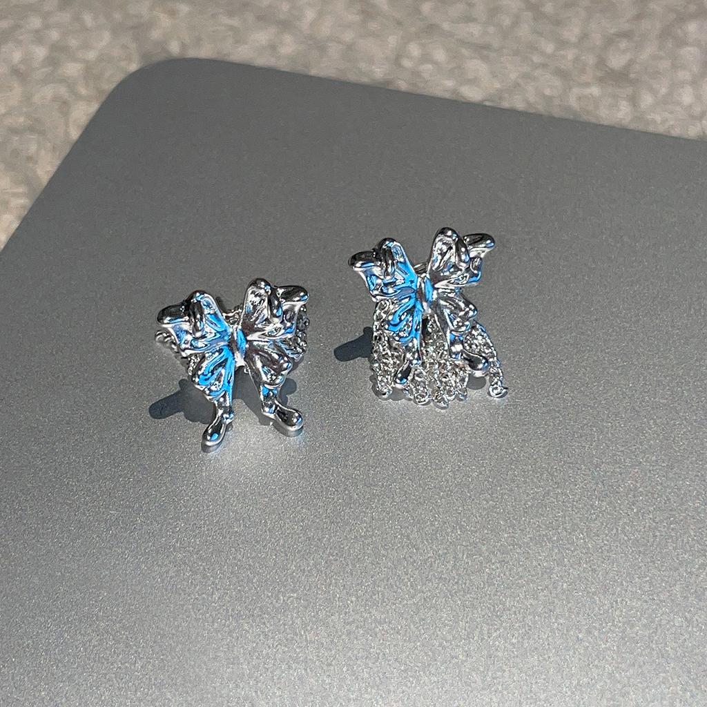 Vielseitige asymmetrische Schmetterlingsstecker Ohrringe Damen super Fee süß ins Wind Quastenohrringe leichter Luxus High-End Ohrringe