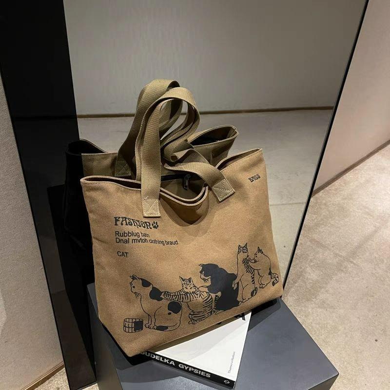 

New large-capacity solid color simple canvas bag women s 2026 Korean versi fashi shoulder bag Japanese simple portable tote