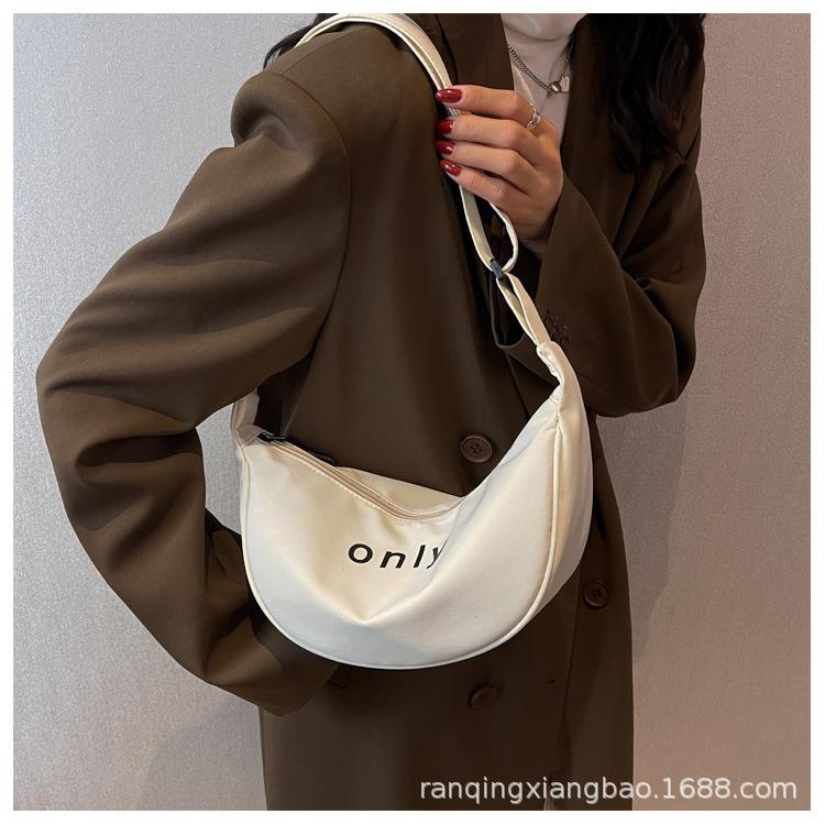 

2024 new messenger bag solid color letter zipper cloth bag dumpling bag simple and fashionable versatile shoulder bag women s bag 29*14*10 off білий колір