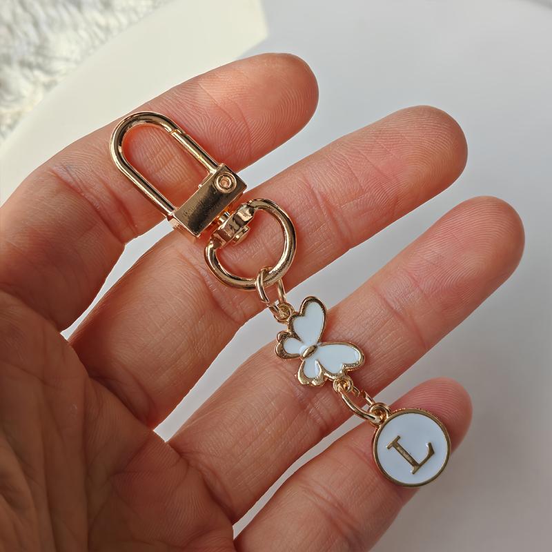 

1 шт. Брелок Легкий Шарм для сумки Шарм с монограммой Металлический брелок Спутник для ключей автомобиля Брелок с монограммой в виде бабочки Долговечность Логотип ключа