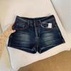 Pantaloncini in denim blu scuro a vita bassa da donna, vestibilità slim, a trapezio, booty shorts, abbigliamento casual da strada, hot pants