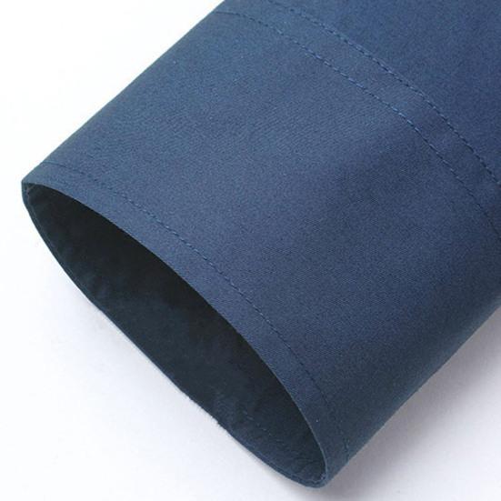 Camisa de manga larga para hombre, cárdigan de un solo pecho con botones de Color sólido, vestido informal con solapa, camisa de primavera para uso diario