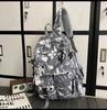 School bag large capacity multi-compartment tide cool junior high school students design sense versatile personality graffiti back