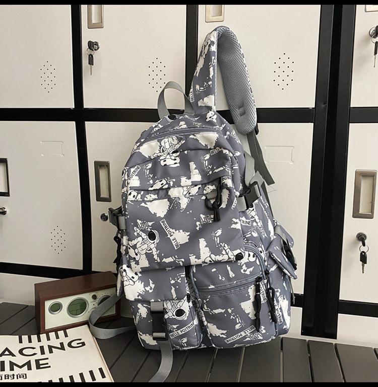 School bag large capacity multi-compartment tide cool junior high school students design sense versatile personality graffiti back