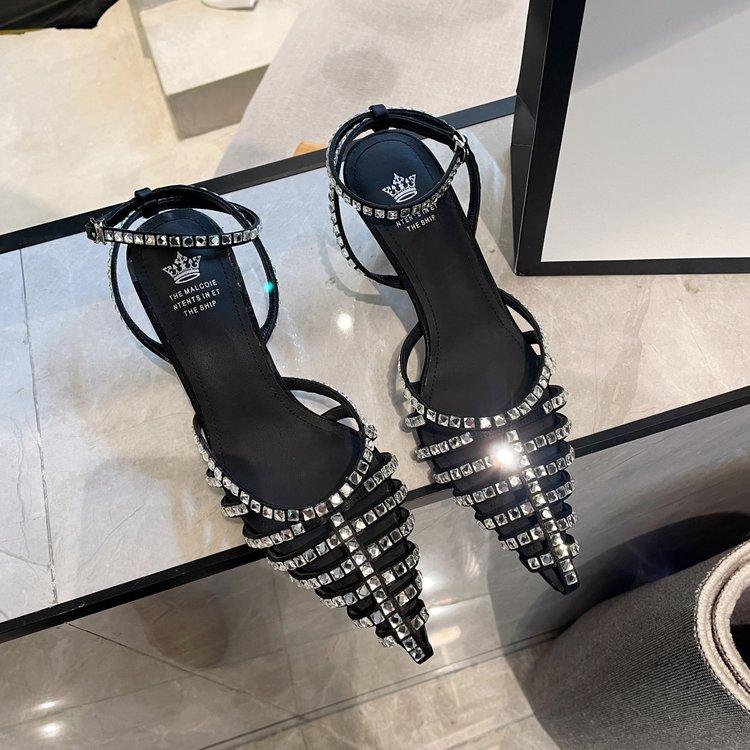 

One-word buckle with rhinestone hollow bag head sandals women s thin heels 2024 summer new sexy empty high heels 35 чёрный