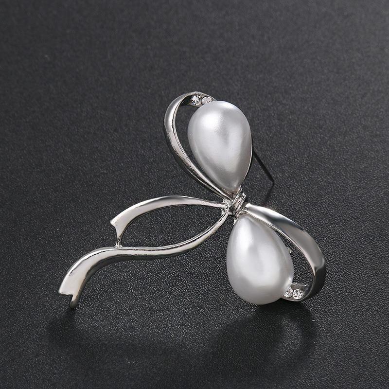 New temperament pearl bow brooch alloy diamond-encrusted brooch anti-light multi-functional large pin