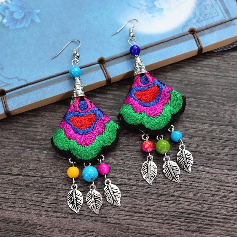 Retro hand-embroidered fabric earrings female long flower fringed versatile temperament performance earrings earrings