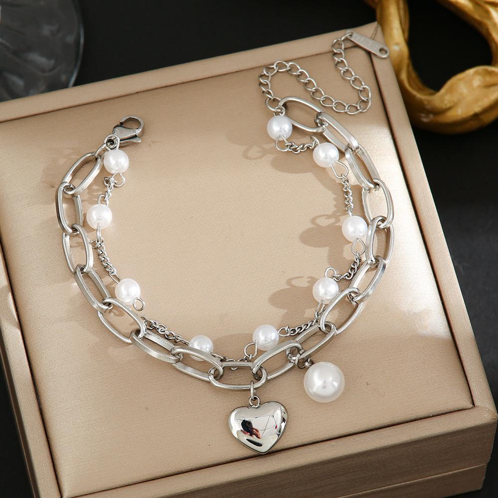 Luxe Titanium Staal Vierbladig Klaver Armband in Koreaanse Stijl met Ingelegde Diamanten voor Vrouwen - Kleurvast