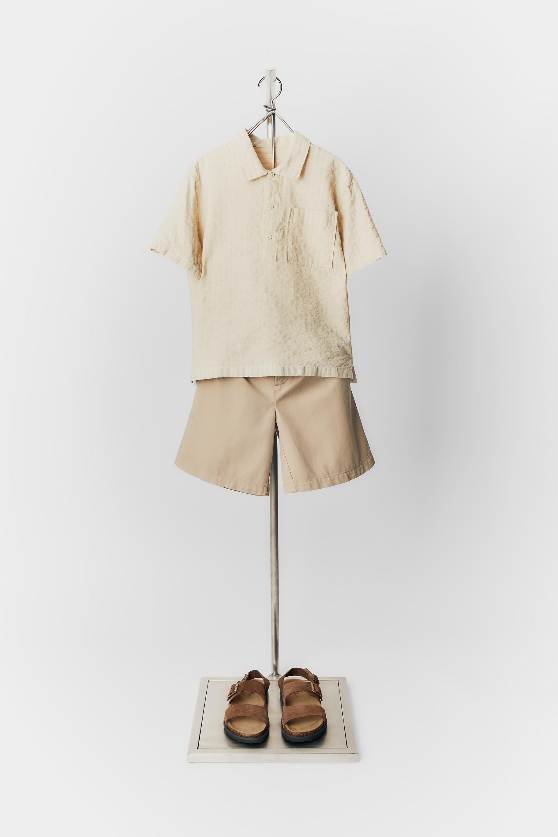 

ШОРТЫ-БЕРМУДЫ В СТИЛЕ КИНОС С ВЫТОНАМИ