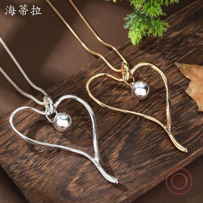 Neue hohle übertriebene geometrische Liebe langer Anhänger, Damen High Sense hohles Herz lange Halskette