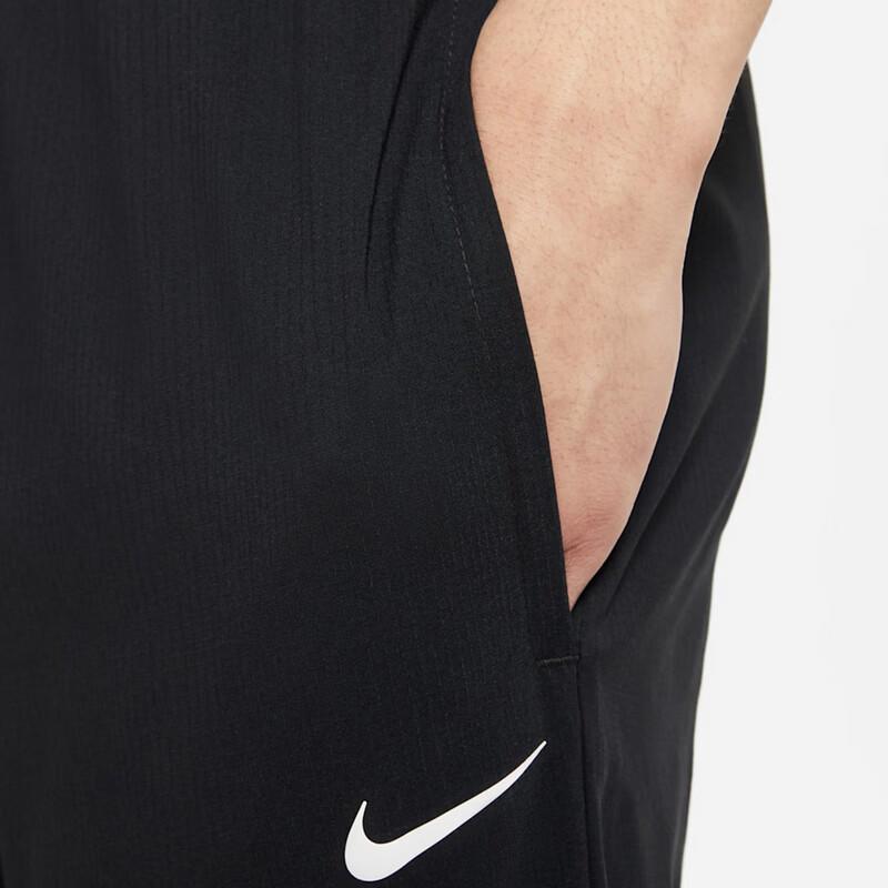 Nike Men's Loose Fit Tapered Woven Track Pants