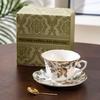 Elegancki zestaw filiżanka do kawy ze spodkiem z porcelany kostnej w kolorze niebieskim i złotym