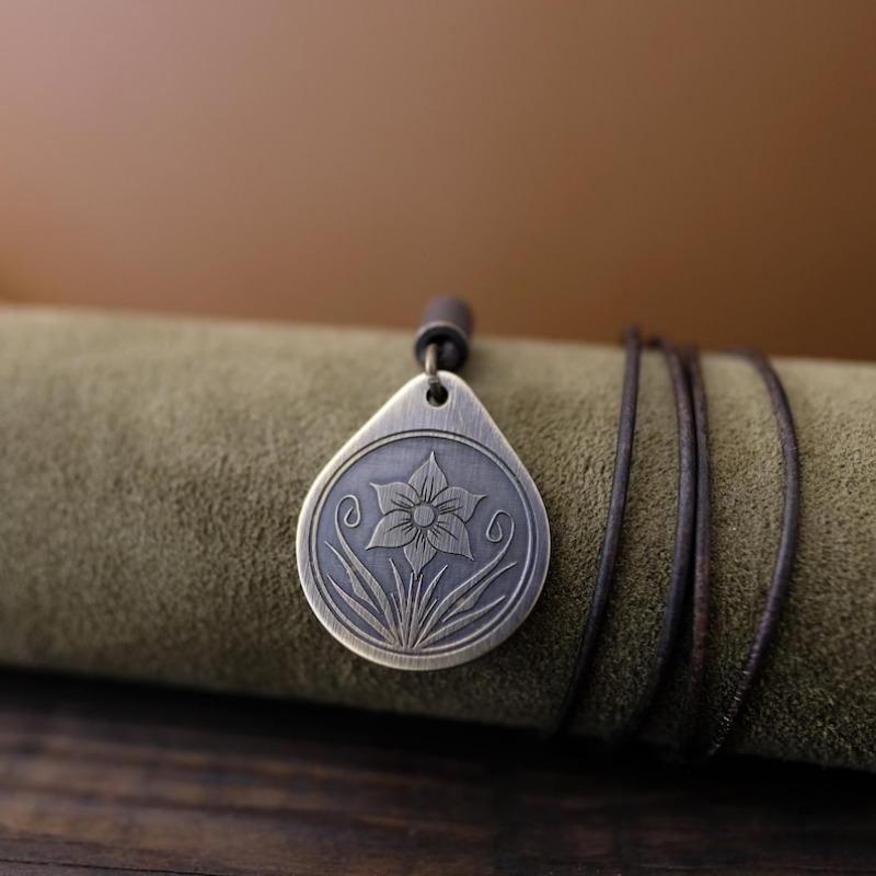 Narcissus necklace/pendant. Made of solid copper and equipped with adjustable/sliding leather rope.