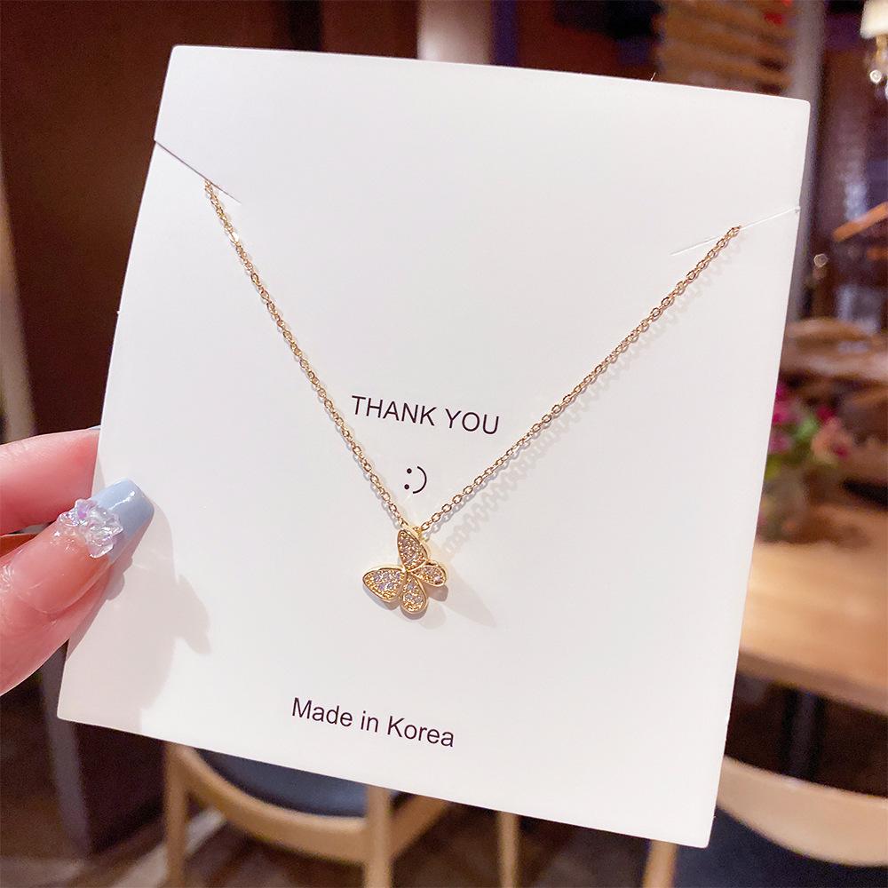 Minimalist Clavicle Necklace: Japanese & Korean Style, Luxurious Real Gold-Plated Titanium Steel Pendant for Women