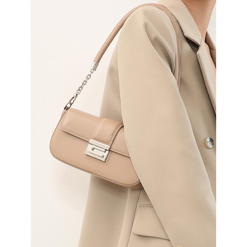 Small bag 2024 new model, high-end niche harmonica chain small square bag, baguette underarm bag, women's shoulder and crossbody bag