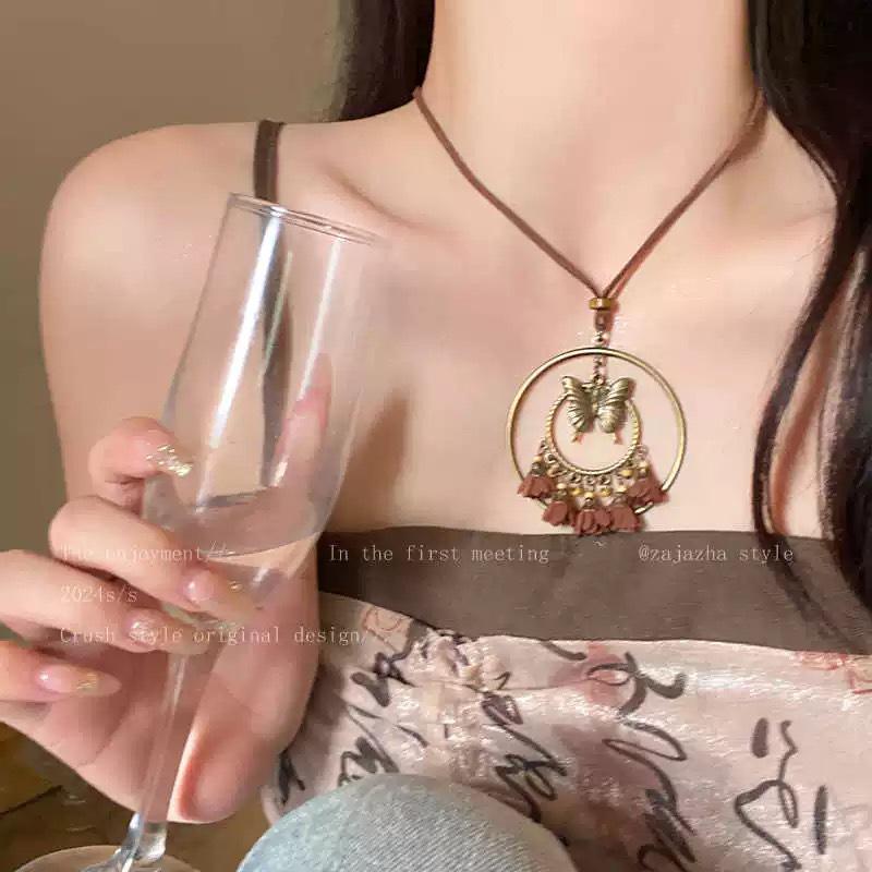 Bohemian Ethnic Style Long Bow Metal Necklace with Vintage Distressed Pendant (2025)