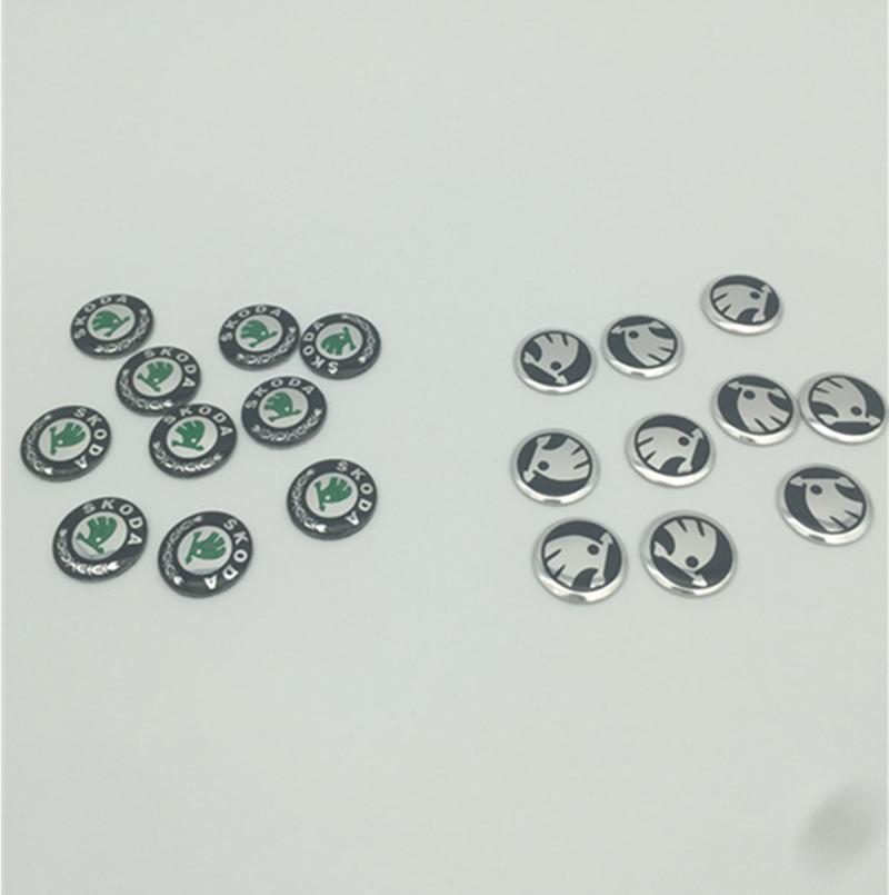 Vdrhn8 2pcs 5pcs 10pcs 14mm Pour boîtier de télécommande de clé de voiture Skoda Bouton de badge Logo de badge Pliage droit Télécommande Porte-clés Autocollant de remplacement