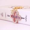 Exquisite Four-Leaf Clover Alloy Keychain Charm - Perfect Gift for Girlfriend, Bag Accent, or Keyring Accessory.