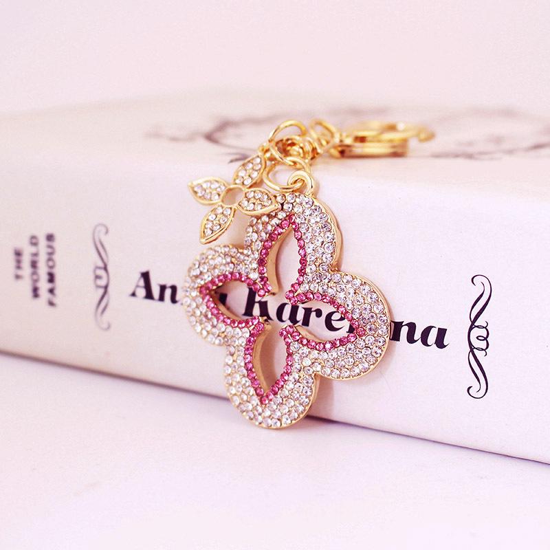 Exquisite Four-Leaf Clover Alloy Keychain Charm - Perfect Gift for Girlfriend, Bag Accent, or Keyring Accessory.