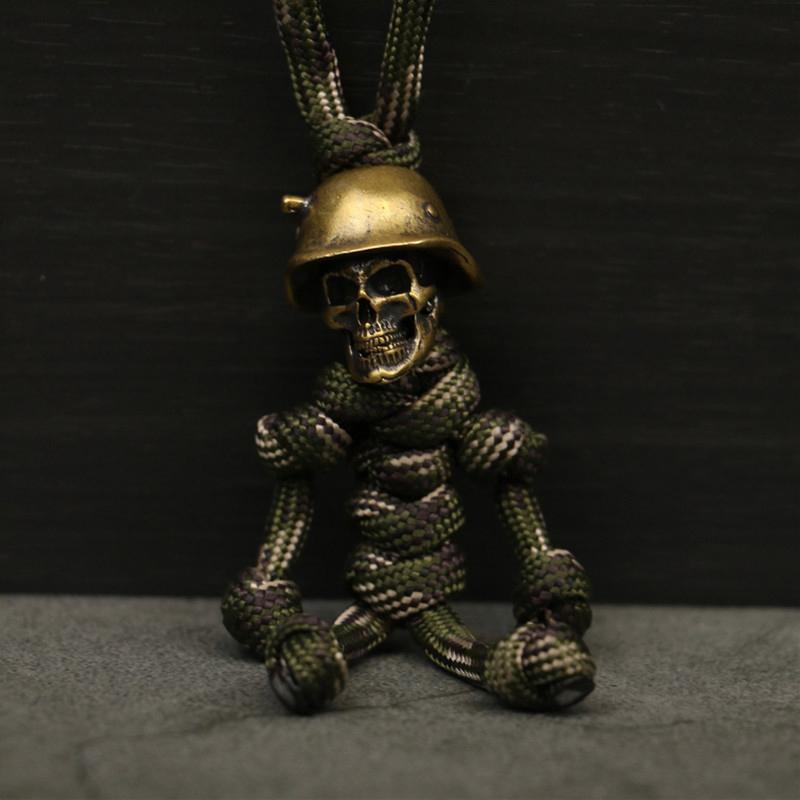 1 pièce Porte-clés Tête de Mort Pendentif Casque de Moto Biker Corde Tressée Paracorde Ami Sac Accrocher Sac à Dos Poupée Jouet