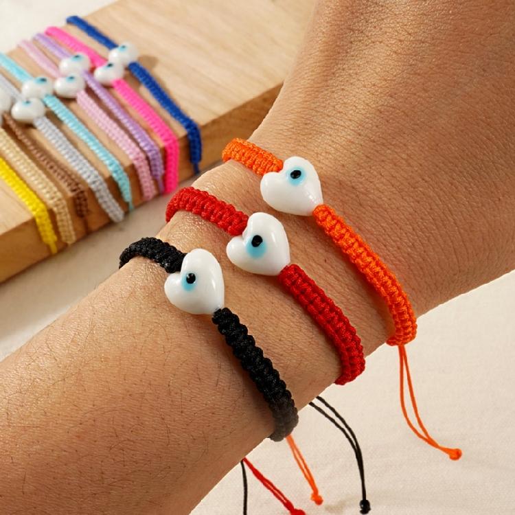 Elegant Braided String Wristband With Spiritual Eye Symbol Versatile Layering Jewelry for Everyday Outfits
