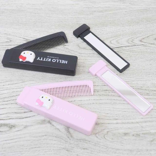 

Компания K - Складная расческа для волос Sanrio Hello Kitty с зеркалом Pink - H25×W102×D17mm