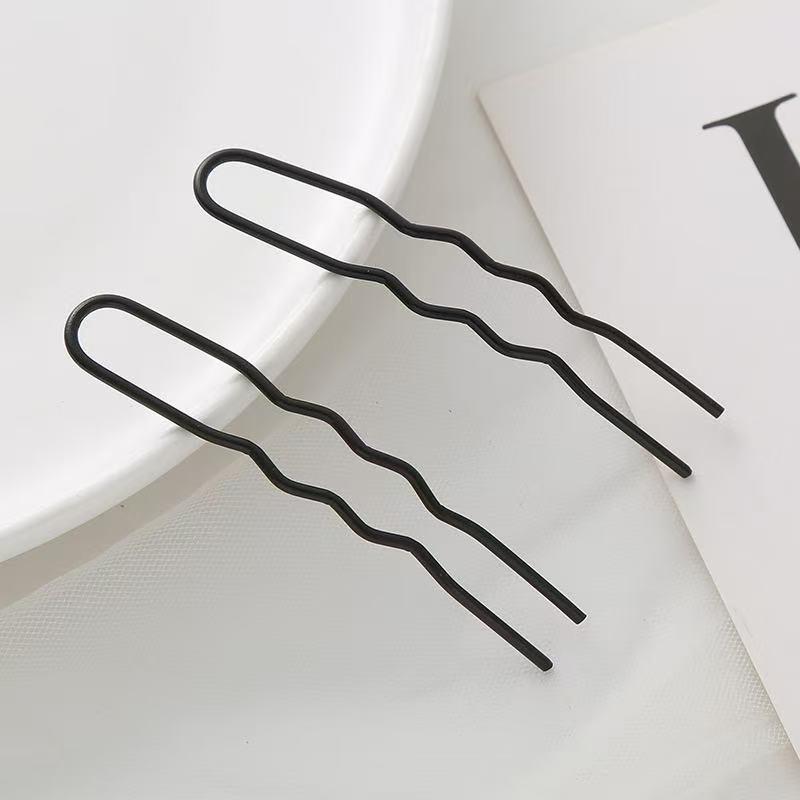 Elegant Hair Bun Tool: Versatile Four-Prong Hairpin Comb for Effortless Styling.