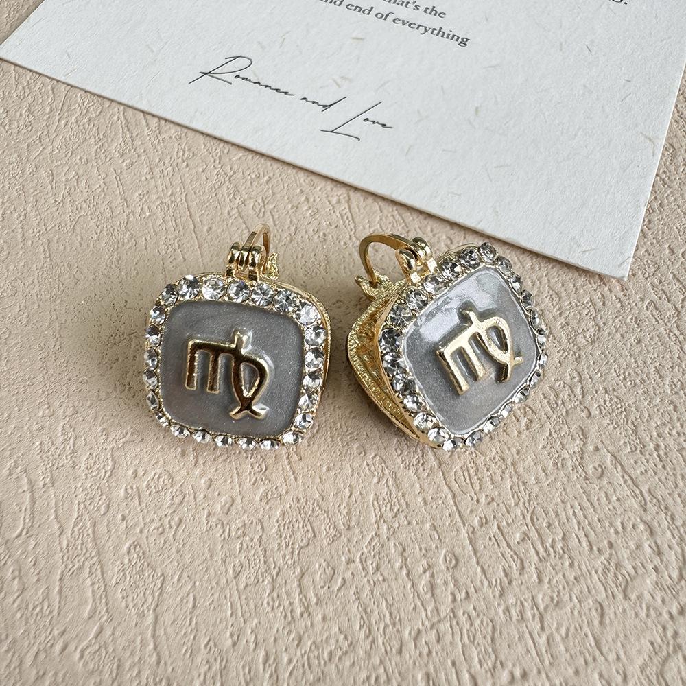 Light Luxury High-End Geometric Constellation Earrings Niche Design Oil-Dripping Ear Buckle French Retro Light Luxury Temperament Earrings Women