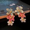 Elegante handbemalte Emaille-Ohrringe mit floralem chinesischem Design