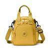Kompakt Nylon Crossbody Miniryggsäck med Topphandtag Casual Liten Dagryggsäcksväska för Kvinnor Daglig Resa