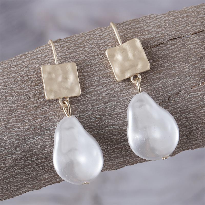 Boucles d'oreilles en perles baroques de mode classique