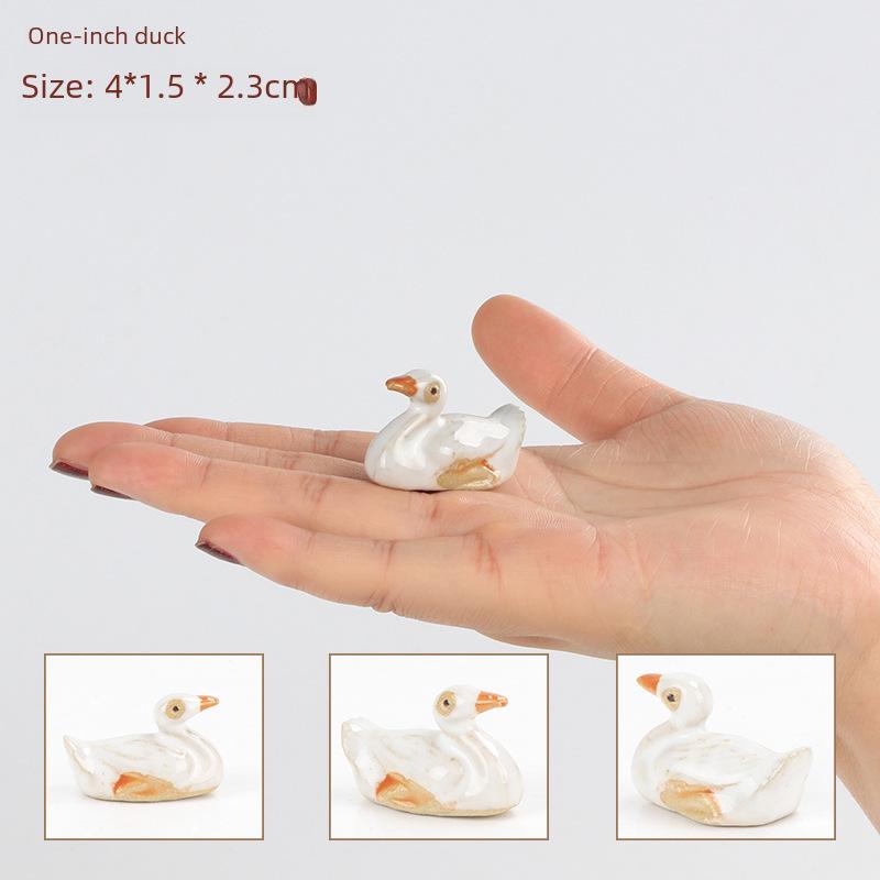 Ceramic Animal Ornaments for Aquarium Landscaping - Includes Duck, Cow, Crane, and Mandarin Duck.