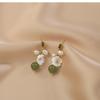 Rice-grain freshwater pearl, gentle and elegant, with a Hetian jade shell flower design, women's silver needle earrings, fashionable handmade