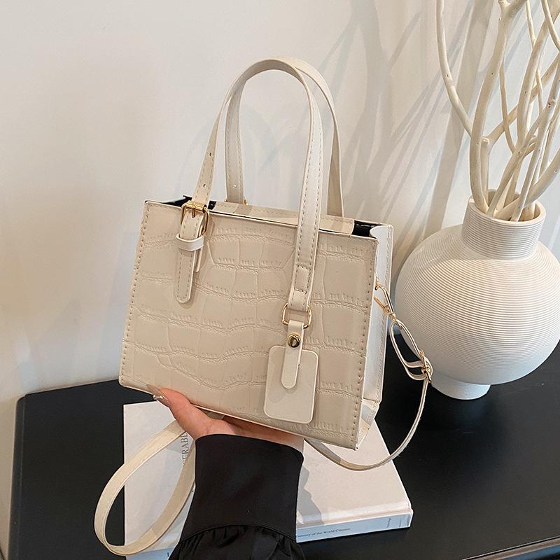 Leather niche temperament bag women's 2025 new light luxury messenger bag high-end portable tote bag