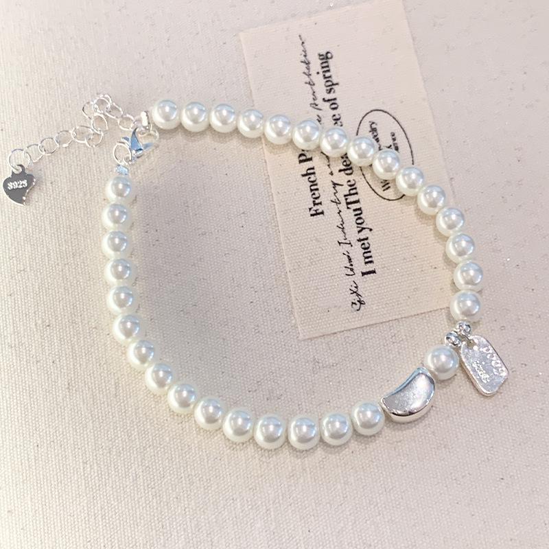 

S925 Silver Pearl Bracelet for Women - Light Luxury Niche Design with Exquisite Charm and Hand Rope Jewelry.