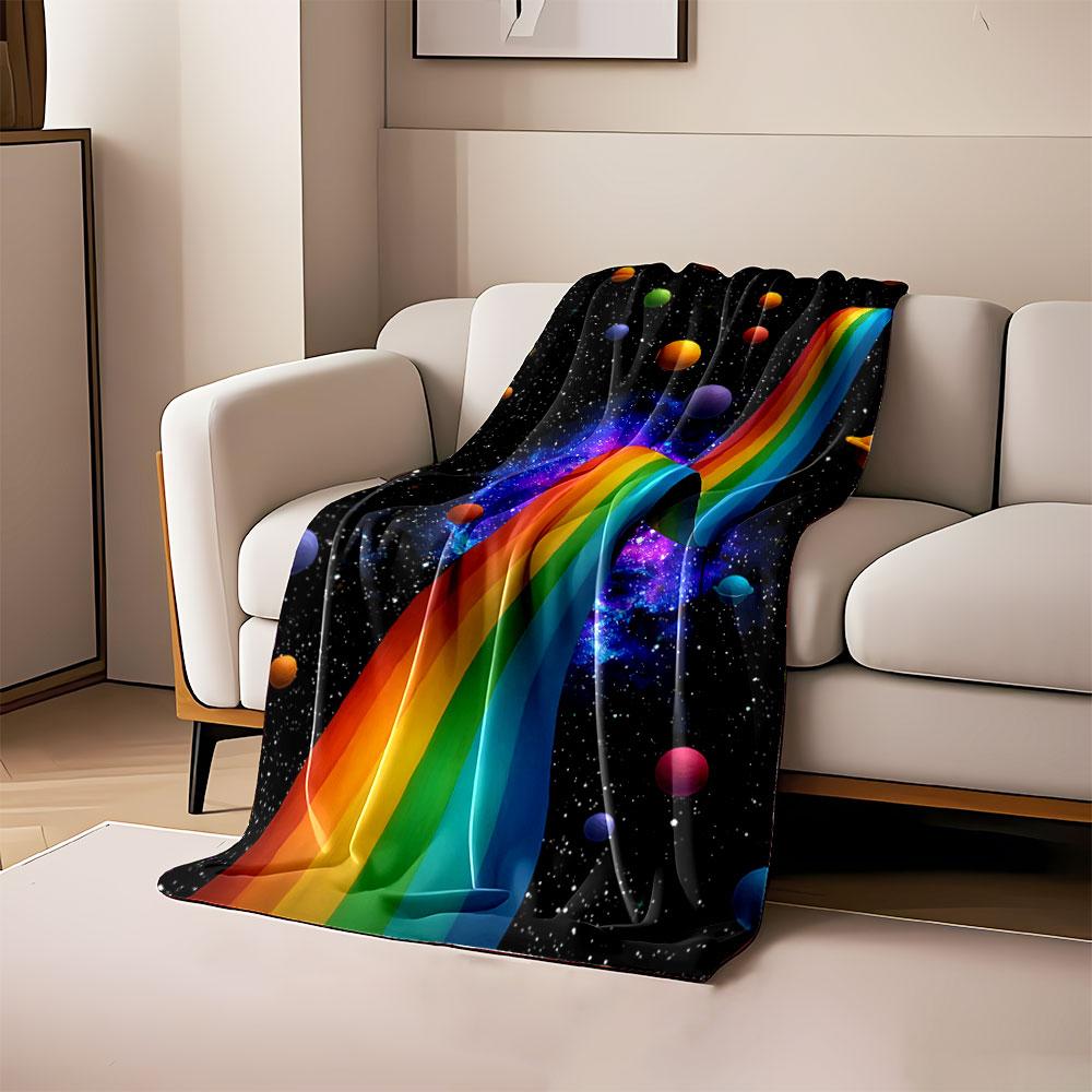 

A flowing rainbow ribbon amidst colorful planets and a starry cosmic backdrop. for all seasons blanket lunch break throw gift 80cm x 120cm