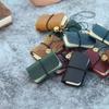 1/4Pcs Mini Cowhide Notebook Key Chain Replaceable Sketchbook Portable Ultra-Small Pocketbook Handbook Loose-Leaf Notepad