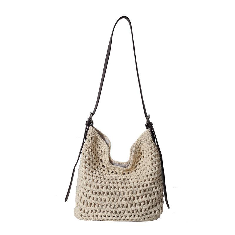 Niche woven hollow bag women's new summer seaside vacation tote bag casual shoulder messenger bag
