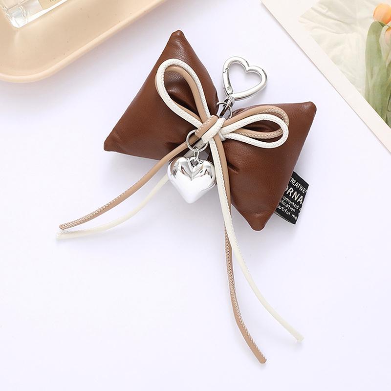 

Роскошный кожаный брелок-бант для женщин и девочек, модный универсальный аксессуар для украшения сумки, чехол для телефона, кулон, подарки