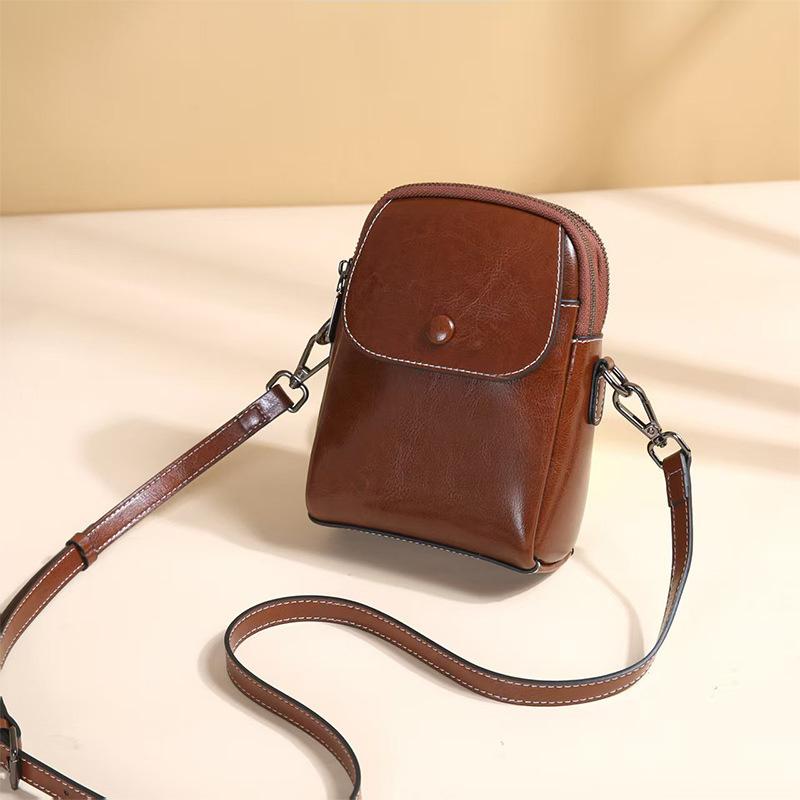 Leather small bag women's new spring and summer fashion vertical mobile phone bag cowhide multi-layer versatile shoulder messenger bag