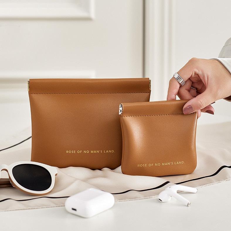 Portable Makeup & Storage Bag with Automatic Spring Clip Closure