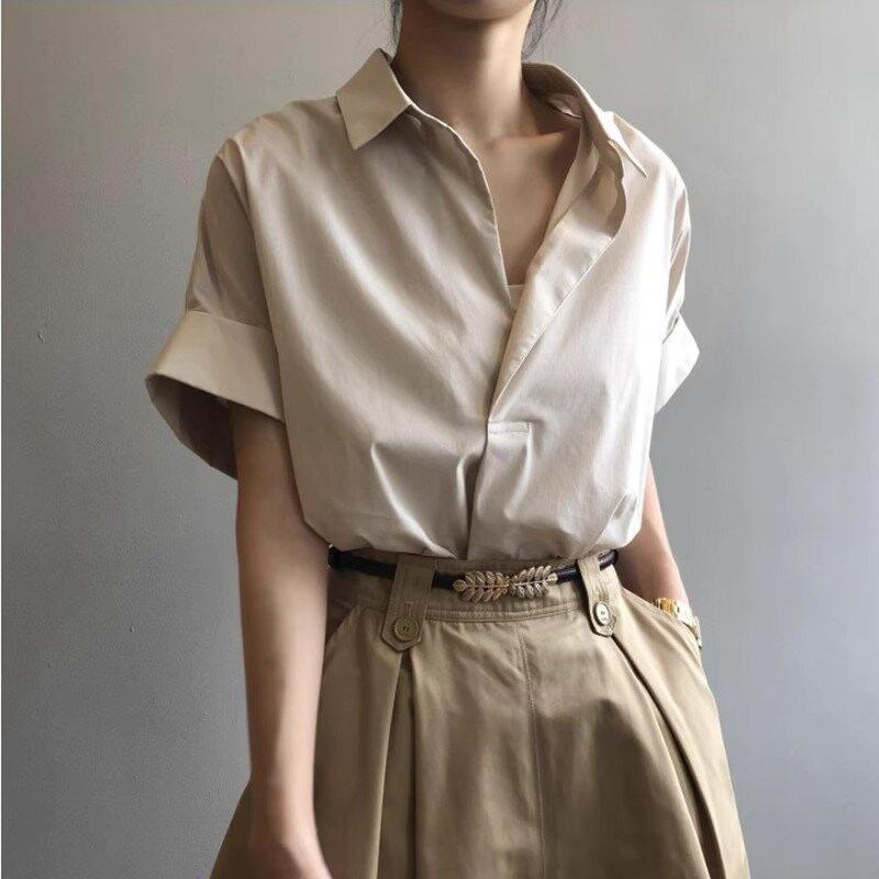 Sommer neues Design Kurzarmhemd Damen Nische Hong Kong Stil Retro Locker V-Ausschnitt Hemd Schickes Koreanisches Top