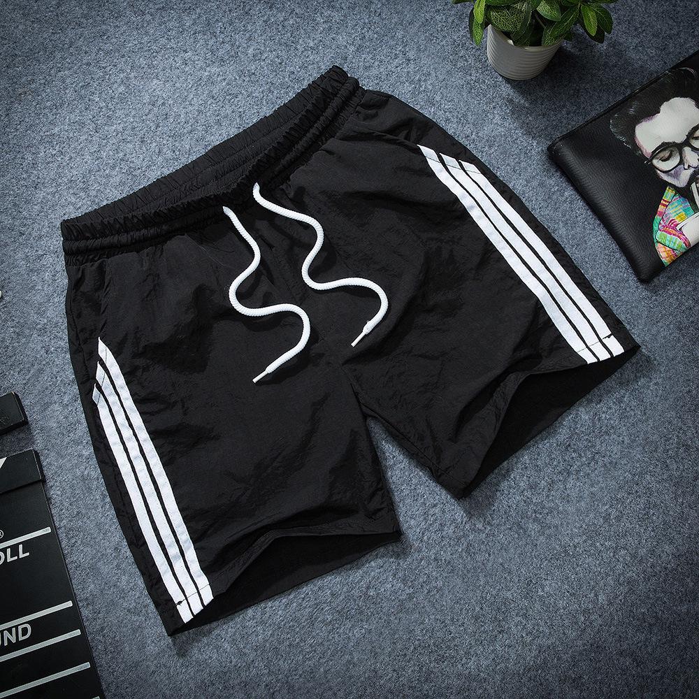 

Men s Quick-Dry Slim Fit Beach & Sports Three-Quarter Shorts M