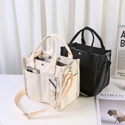 Dreidimensionale Canvas-Tragetasche mit mehreren Taschen: Vielseitige Messenger- oder Lunchbox-Tasche