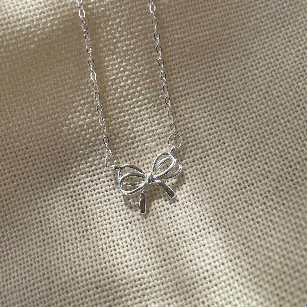 

Версия 925 пробы стерлинговое серебро трехмерный полый кулон-бант универсальная простая цепочка на ключицу с темпераментом в стиле инстаграм 925 sterling silver