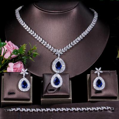 CMM Luxuriöses 4-teiliges Halsketten-Ohrring-Armband-Ring-Set mit Wassertropfen-Zirkonia für Bräute