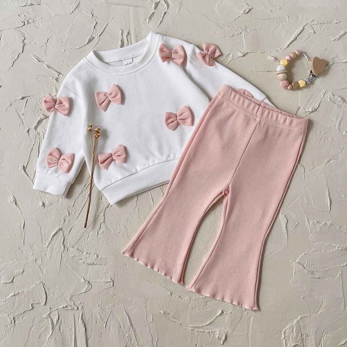 

Комплект из двух предметов для малышей в корейском стиле: 3D топ с бантом и расклешенные брюки 18-24M/90 коралловый