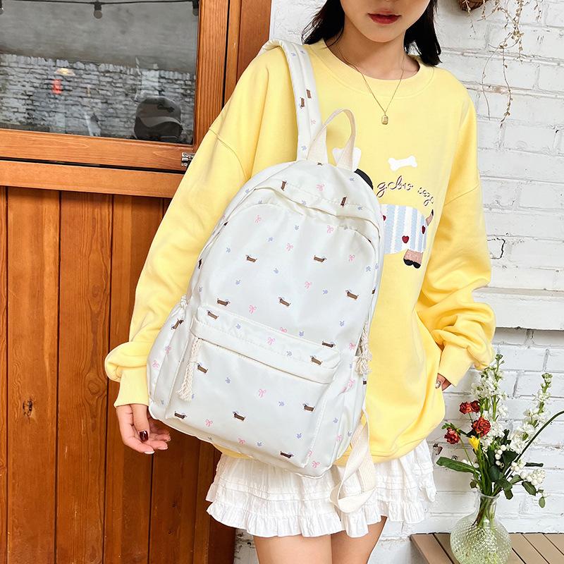 School bag female junior high school student fashion printed backpack Korean college style backpack ins cute travel backpack