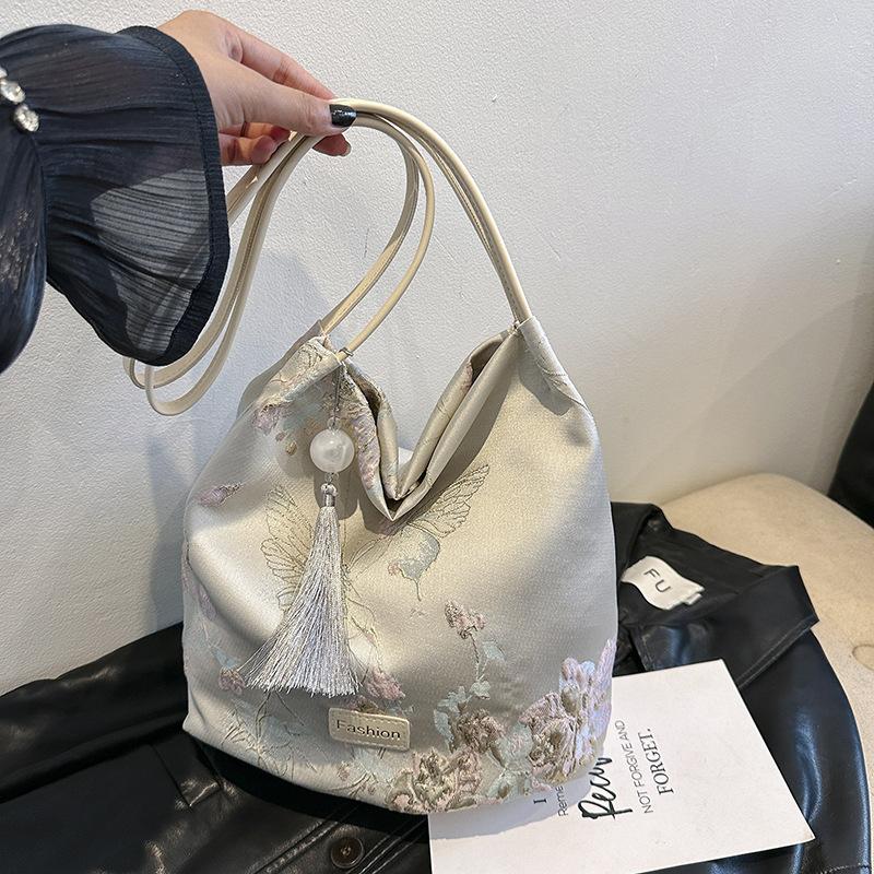 

Нова модна сумка-багет великої місткості в китайському стилі для жінок. Нова мода, для роботи, для поїздок, на одне плече, сумка-відро.